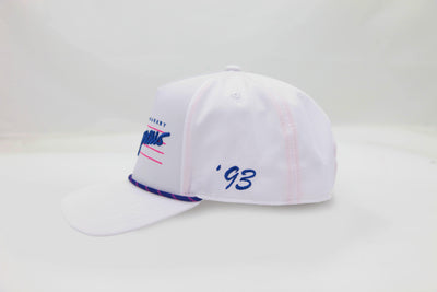 Side view of The Dangerous ’93 Hat – white hat with ‘93 embroidery in blue and blue and pink rope detail across the brim.
