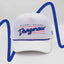 Front view of The Dangerous ’93 Hat – bright white hat with retro “Dangerous” logo in bold blue script and pink background lines, with Maxwell Sharkey in small print above the script. It features a blue and pink rope detail across the brim.