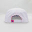 Back view of The Ice Dangerous ’93 Hat – white cap with adjustable strap and small, pink loop tag accent featuring the Maxwell Sharkey shark fin icon.