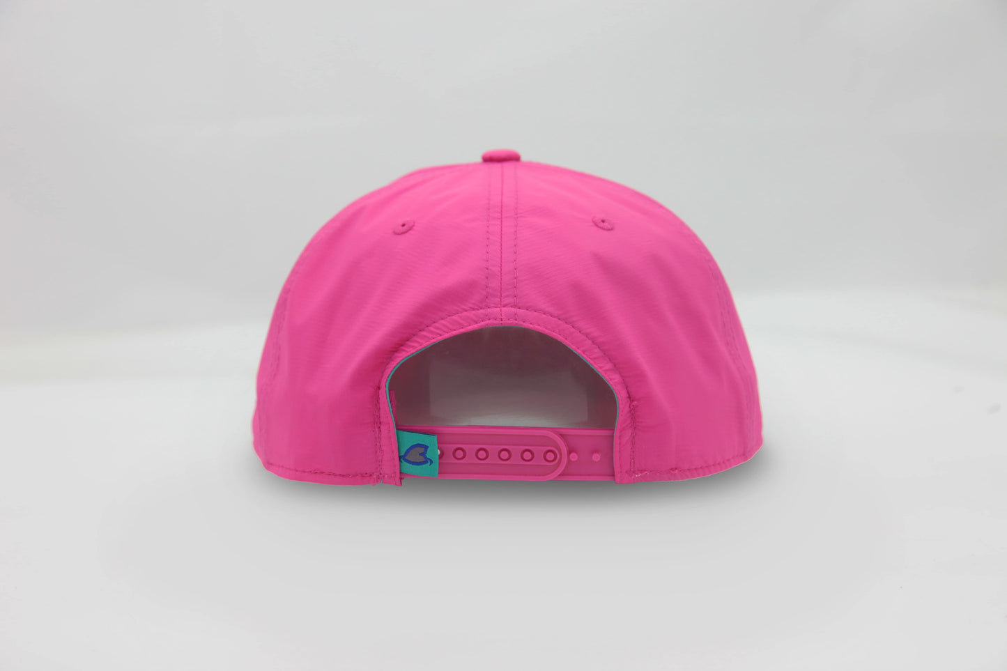 Back view of The Sunset Slasher ’93 Hat – hot pink cap with snapback closure and embroidered detail.
