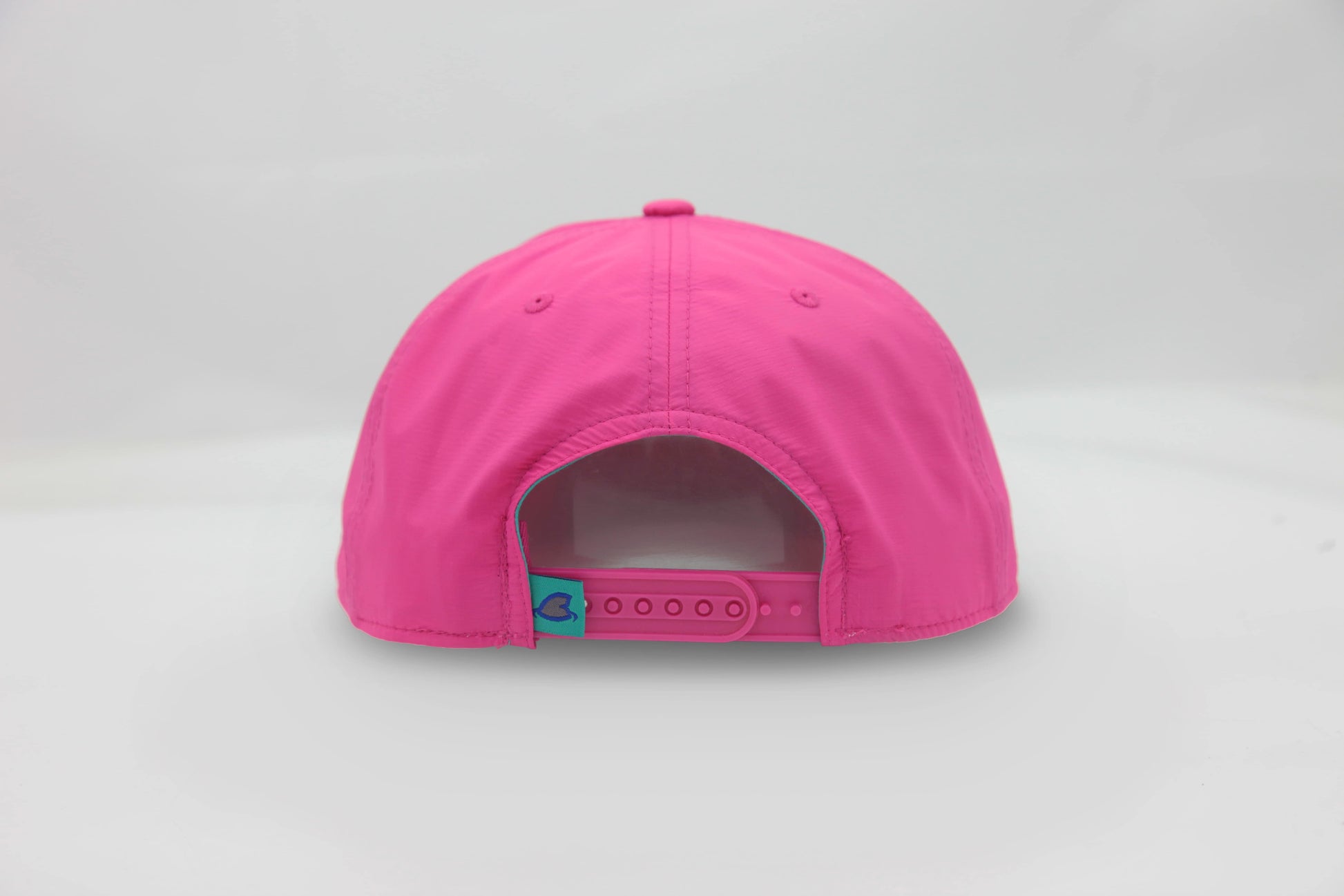 Back view of The Sunset Slasher ’93 Hat – hot pink cap with snapback closure and embroidered detail.