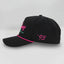 Black embroidered baseball cap with 'Sharkey Swim' text on front, pink rope detail on brim, and '93 on side panel